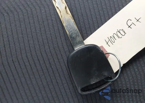 2009 Honda Fit Dx-A z USA, uszkodzony, nr VIN JHMGE87349S805269